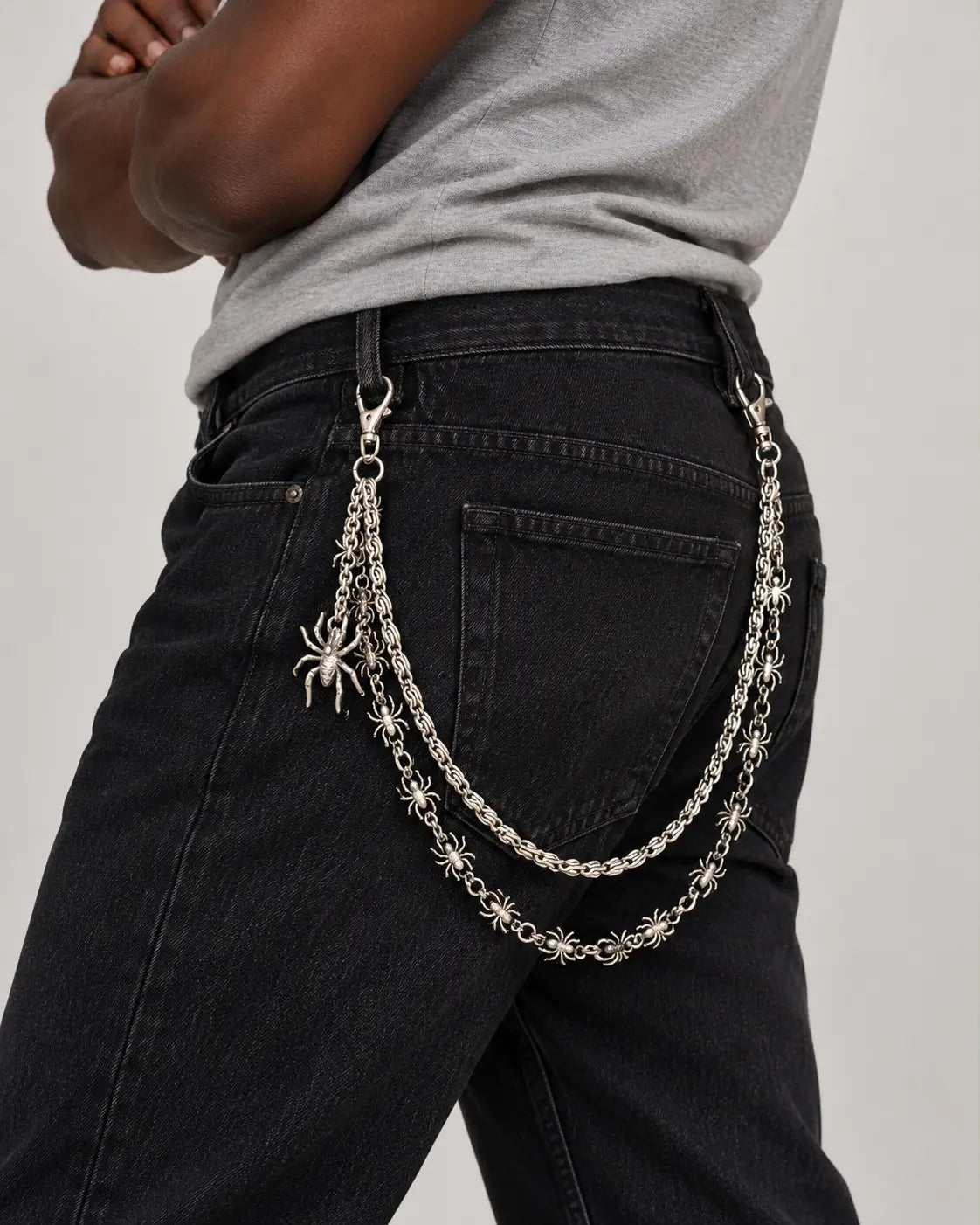Cadena de arañas para pantalón